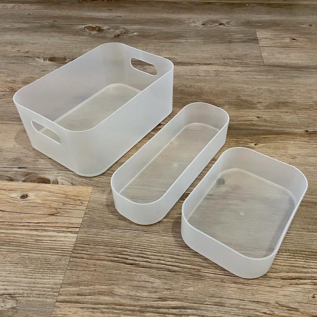 Author's Muji plastic storage boxes x3 in various sizes