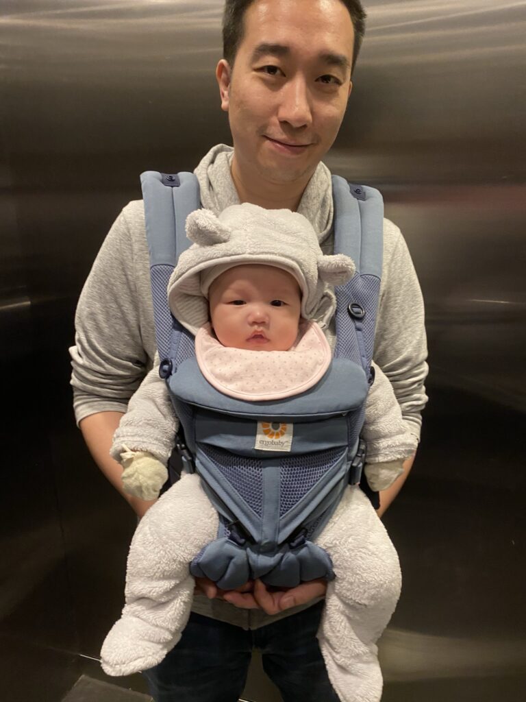 Father carry baby in the Ergobaby 360