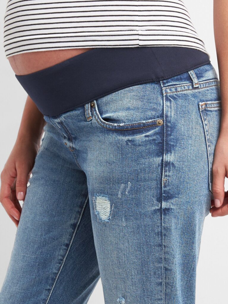 Gap maternity demi panel repaired girlfriend jeans in medium indigo - zoom in on demi panel waistband