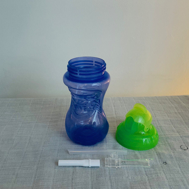 Nuby-flip-it-no-spill-beaker-in-blue-and-green-disassembled