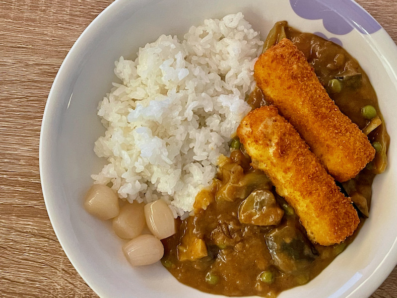 Japanese curry served with fish fingers