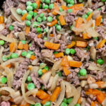 Step5 add peas to beef and vegetables and fry