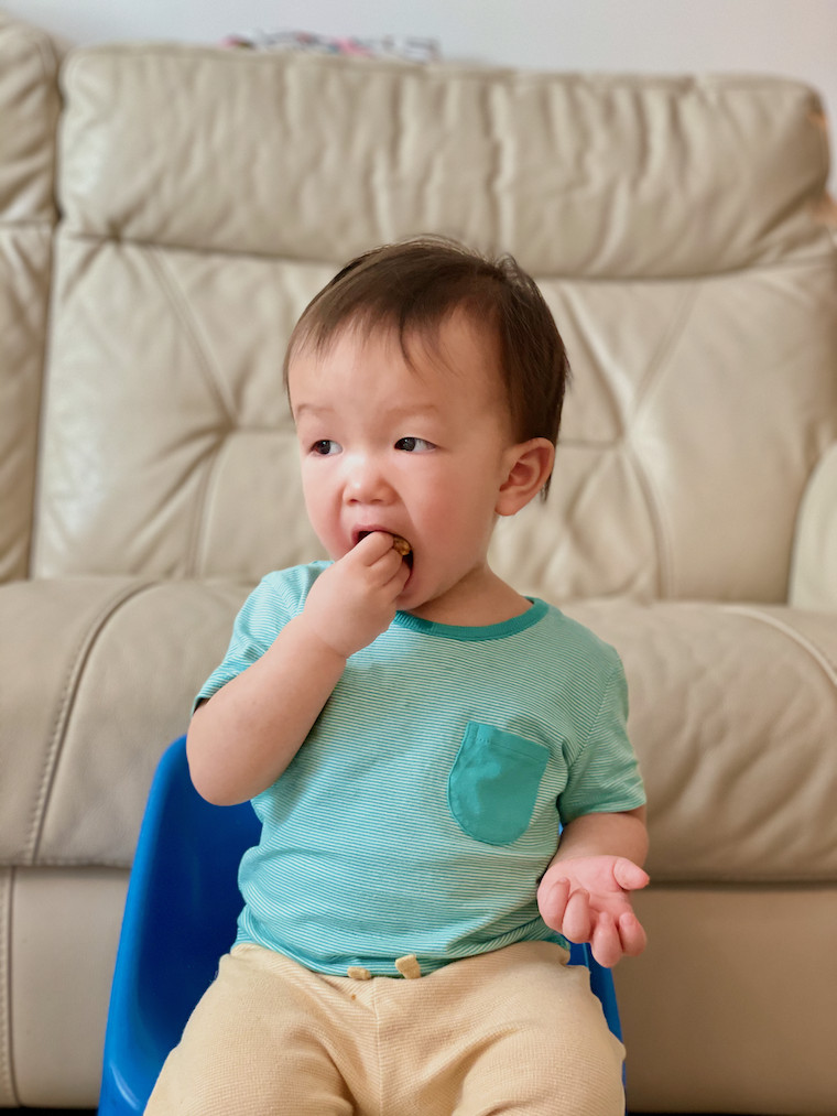 Boy eating ABC muffin 1