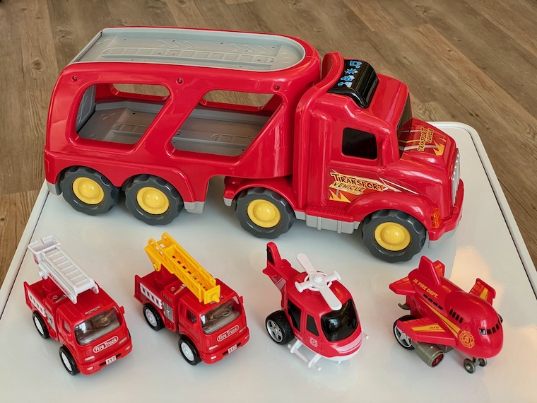 Fire Engine Toy with little toys lined up